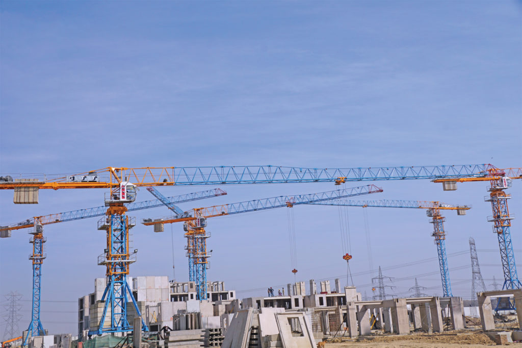 Explaining why tower cranes are becoming increasingly important in precast building constructions